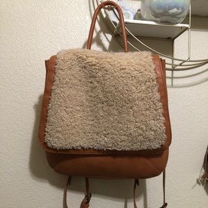 Tan faux leather sherpa backpack adorable for Fall/Winter
